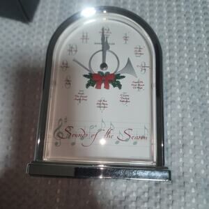 HOWARD MILLER EUC SOUNDS OF THE SEASONS ALARM CHRISTMAS CLOCK